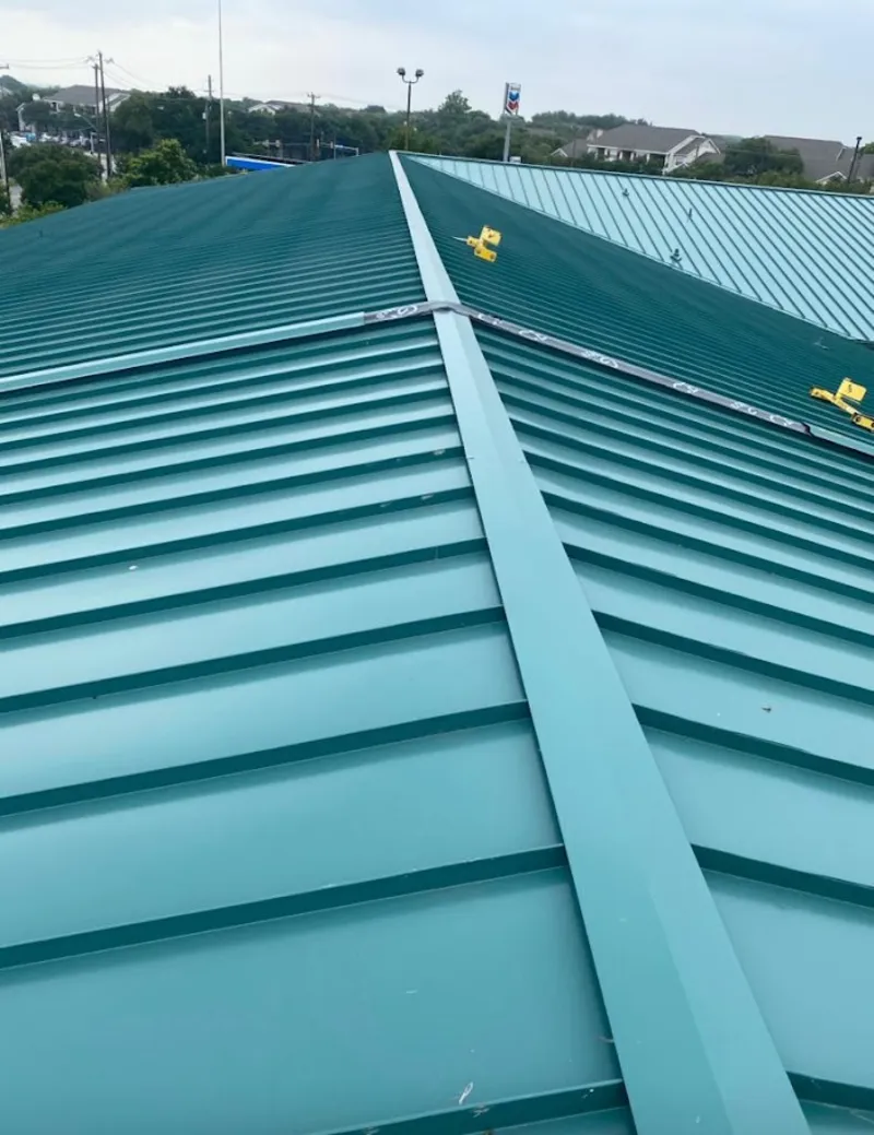 Green commercial metal roof ridge and valley for Metal Roof Repair in Cooper